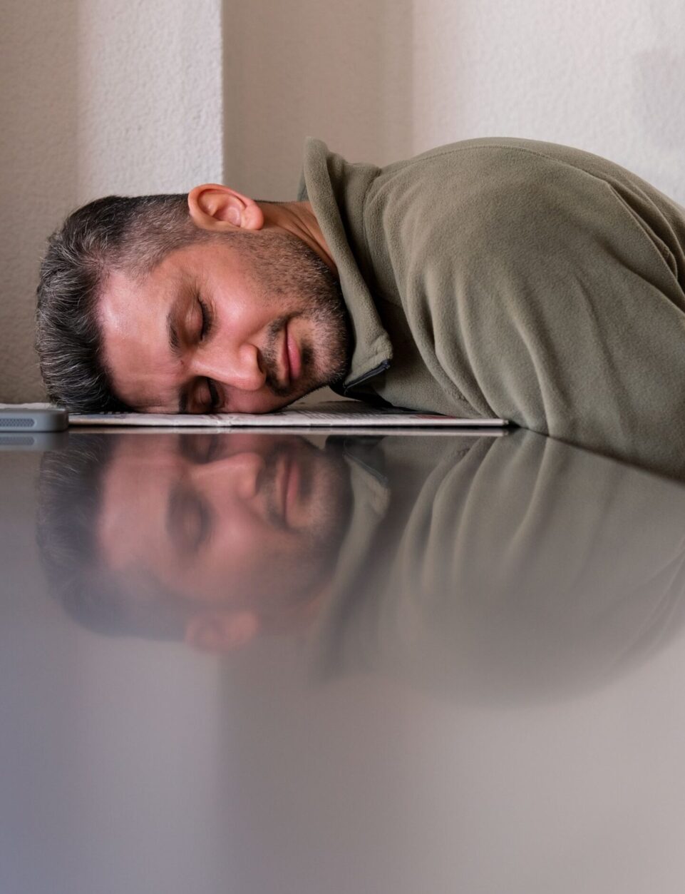Exhausted person at desk