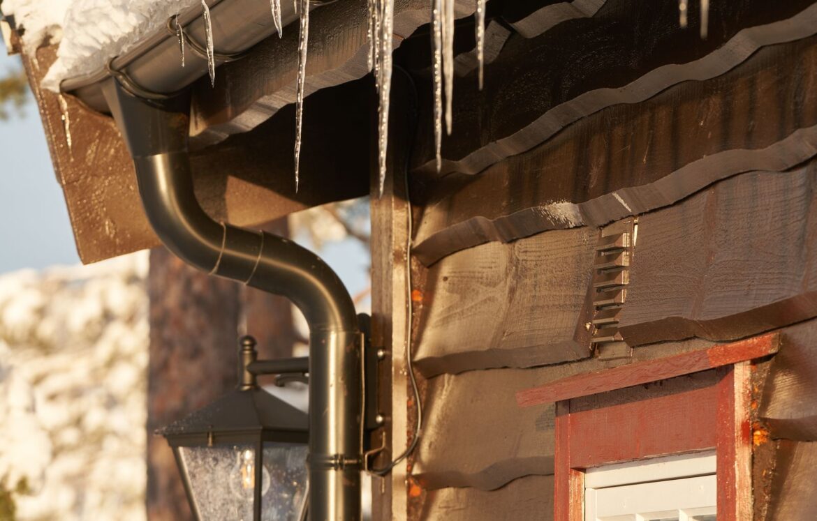 pexels-photo-8875446 Icicles on winter house exterior