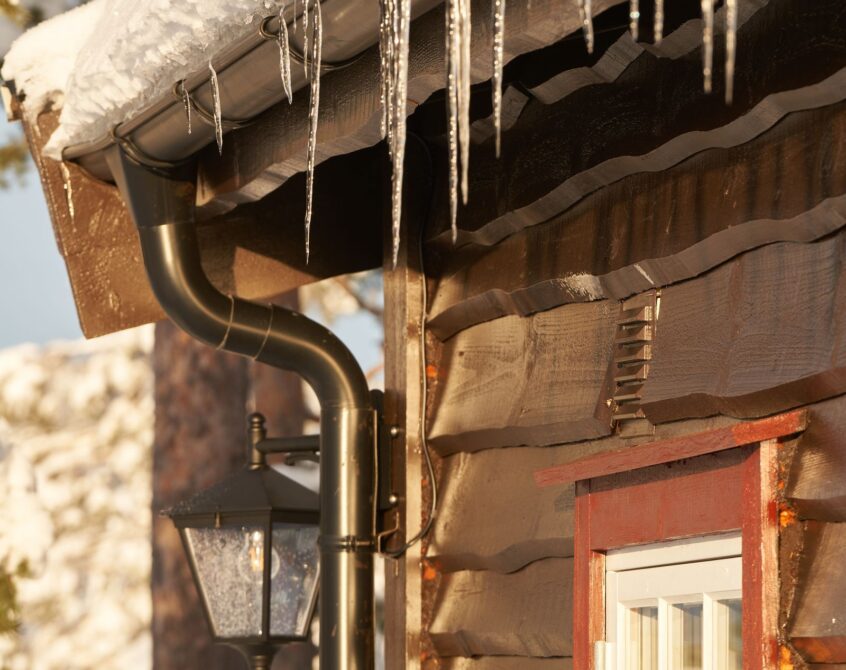 Icicles on winter house exterior