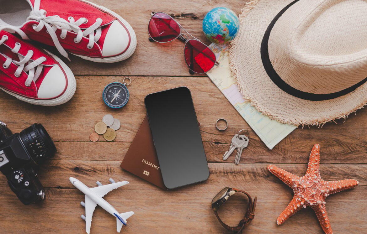 Travel accessories costumes. The cost of travel maps prepared for the trip.travel planning concept Travel accessories costumes. The cost of travel maps prepared for the trip.travel planning concept